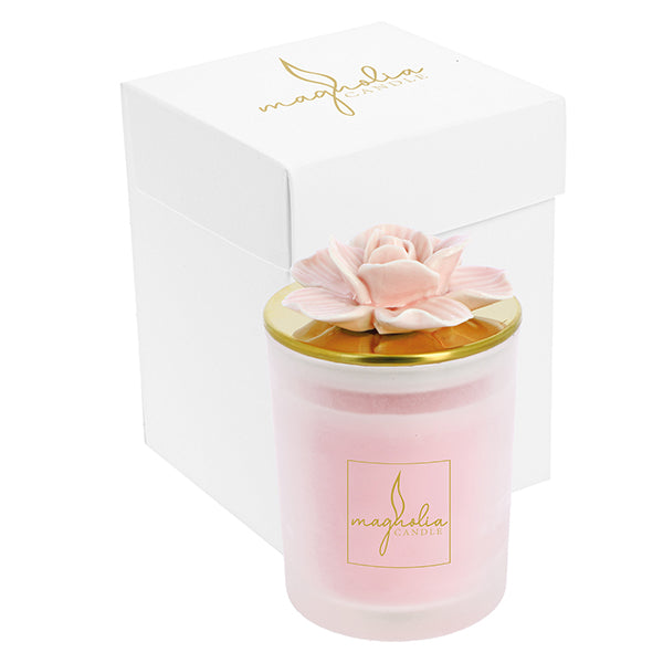 Bomboniera Magnolia candle con tappo oro e magnolia rosa