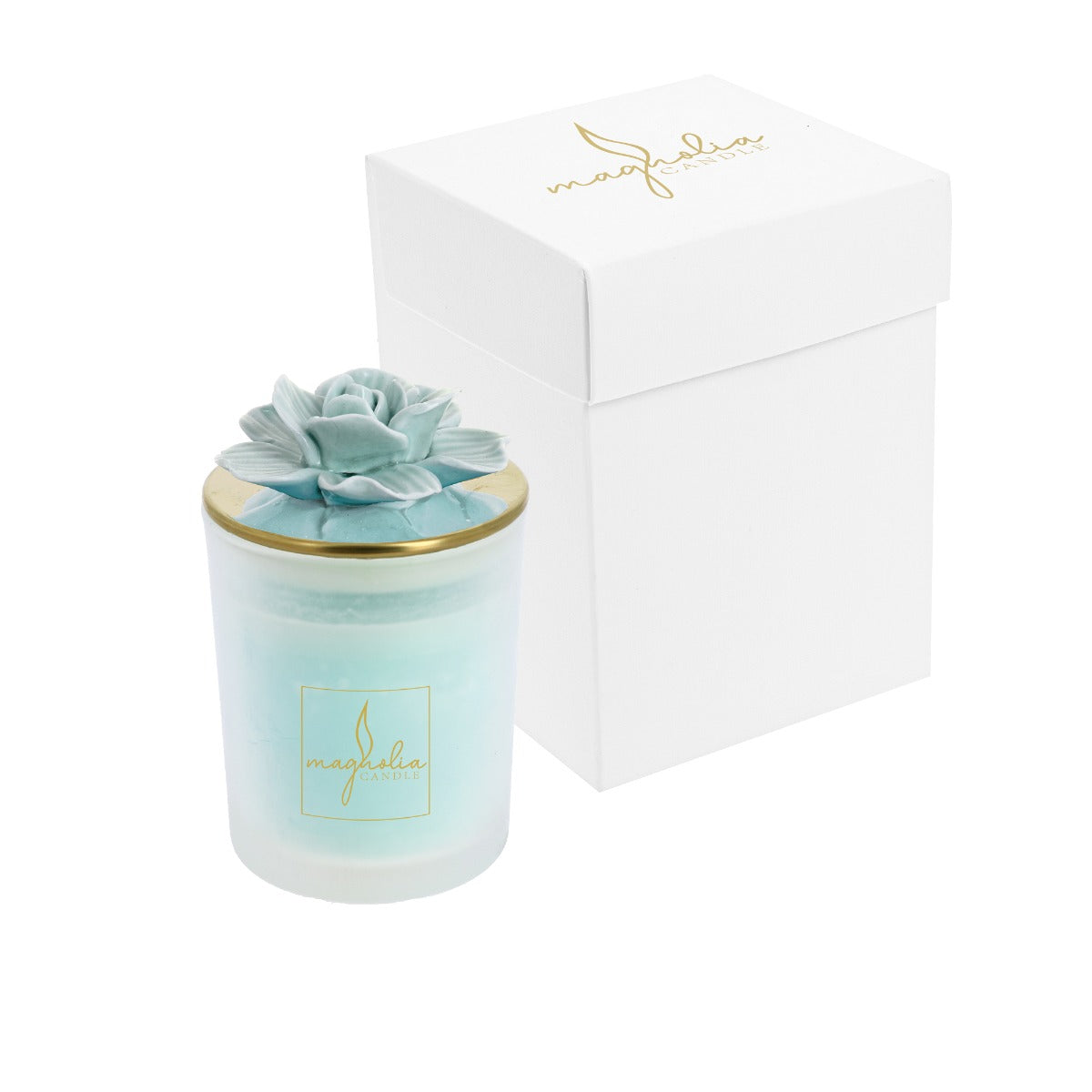 Bomboniera Magnolia candle con tappo oro e magnolia acqua marina