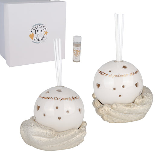 Bomboniera illumina diffusore sfera led su mani
