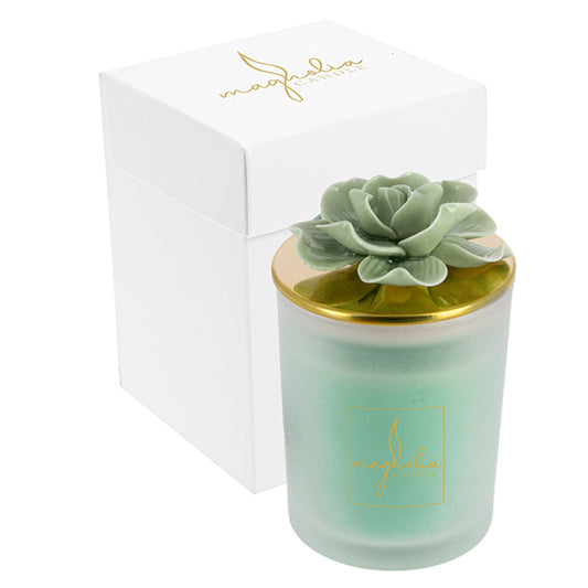 Bomboniera Magnolia candle con tappo oro e magnolia verde salvia